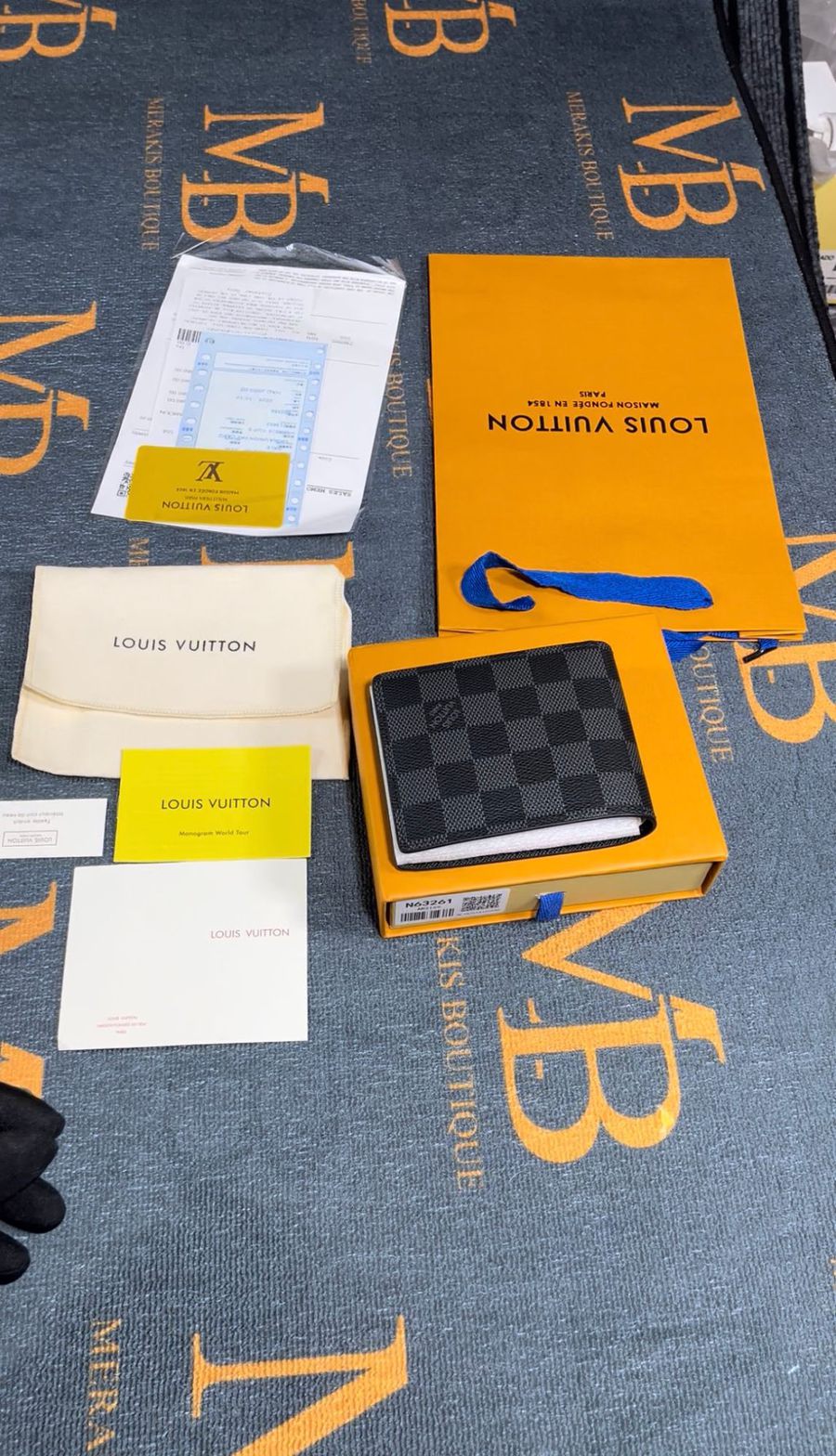 Damier Graphite wallet in its orange box with dust bag